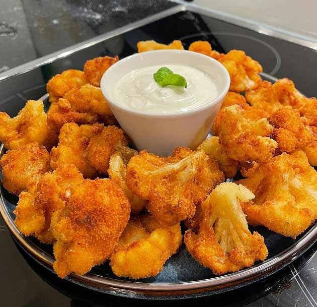 طرز تهیه گل کلم سوخاری خوشمزه و پفکی به روش رستورانی ، دستور پخت گل کلم سوخاری با خمیر پنبه در فر به صورت ساده و رژیمی